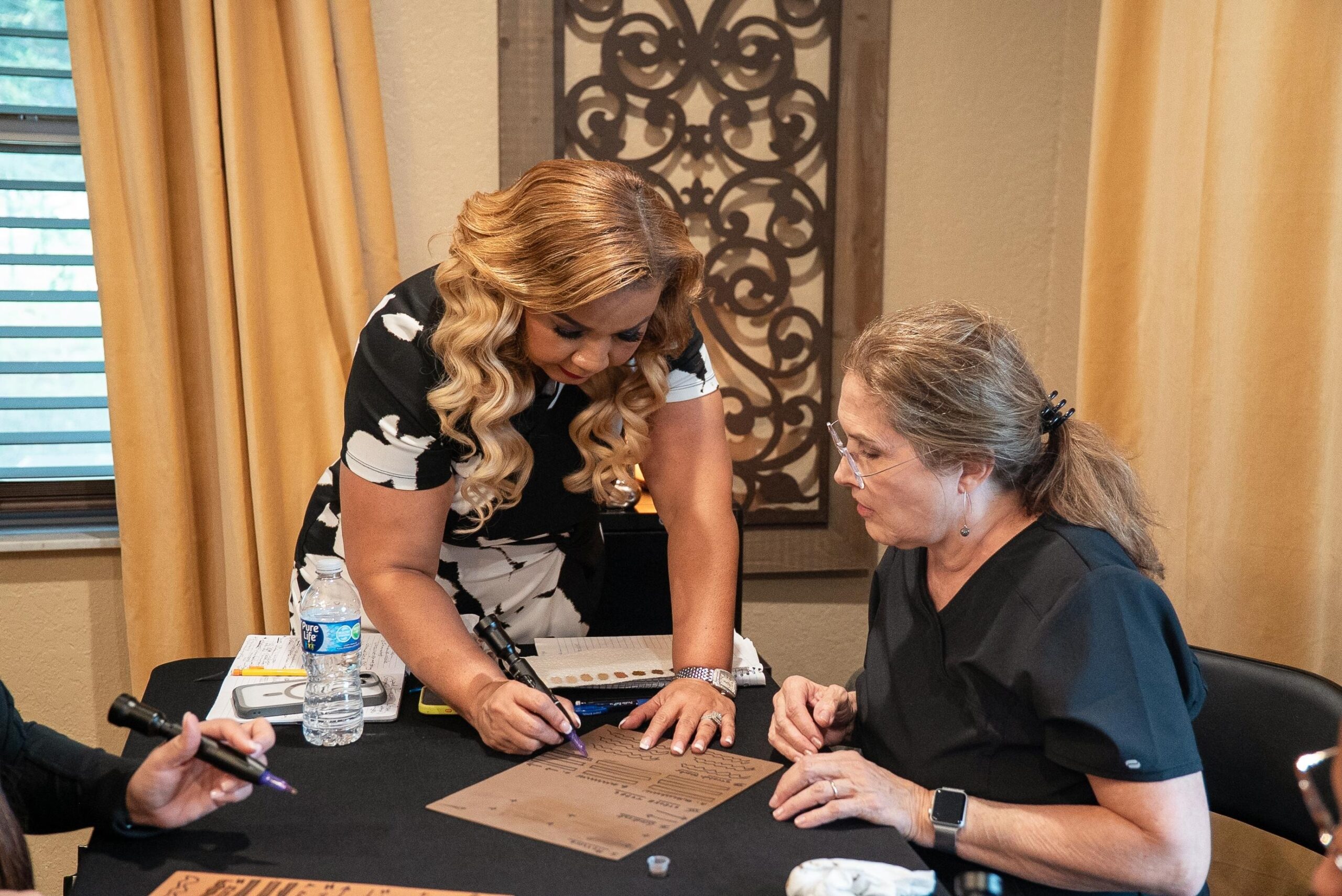 Dr Rusnak reviewing treatment plan — Powder Botox Treatment — needle-free botox alternative